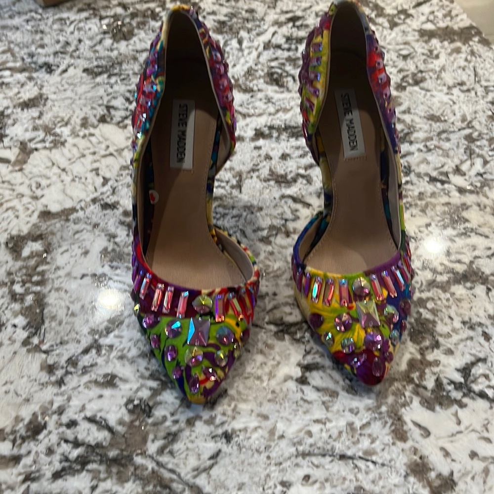 Multi colored rhinestones.  Rare high heels